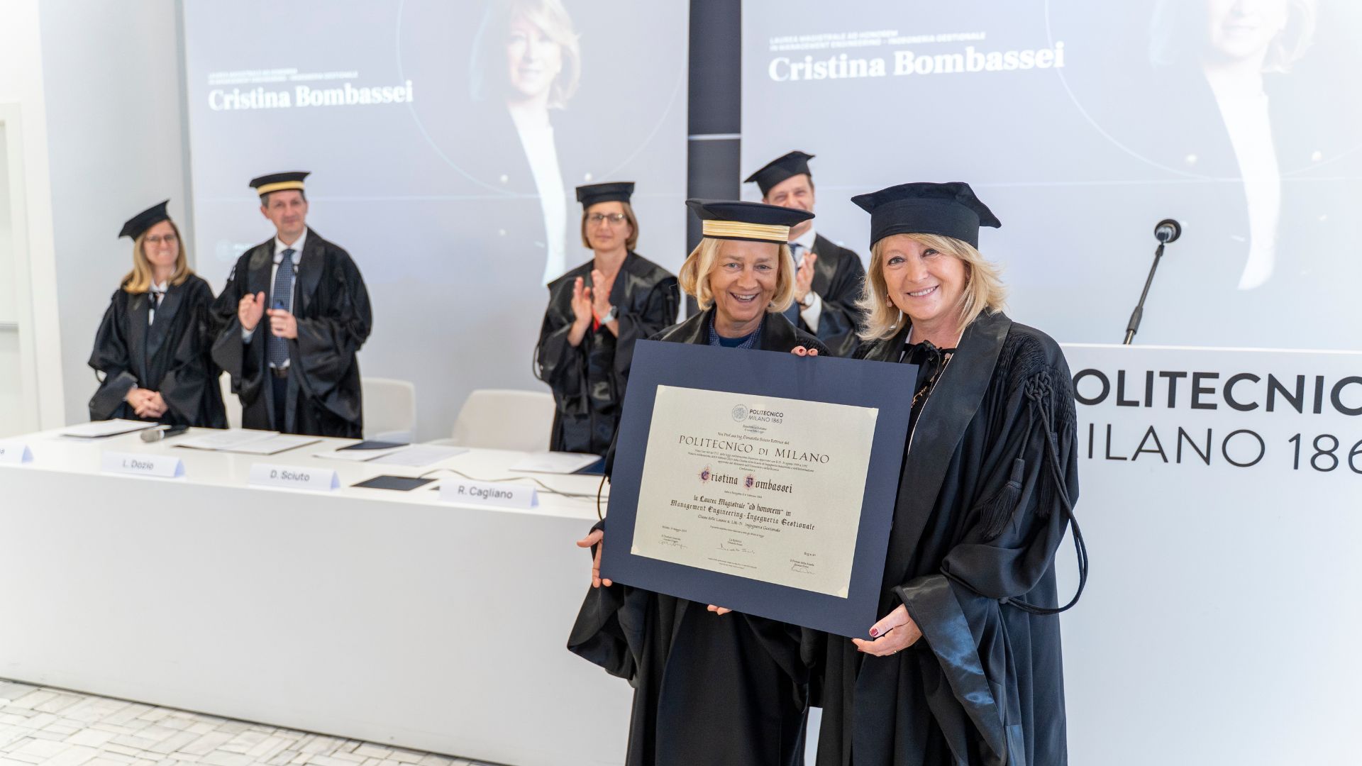 Donatella Sciuto and Cristina Bombassei with degree parchment